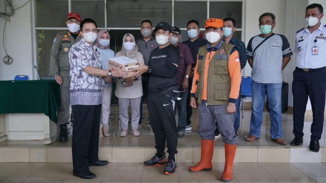 
 Pemkot Kotamobagu Serahkan Bantuan Untuk Korban Bencana Alam Di Manado