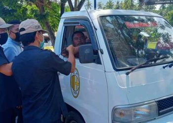 Antisipasi Penyebaran Covid-19, Bawaslu Bolsel Sudah Tiga Kali Bagikan Ratusan Masker pada Warga dan Pengemudi, Kali Ini di Kecamatan Tomini