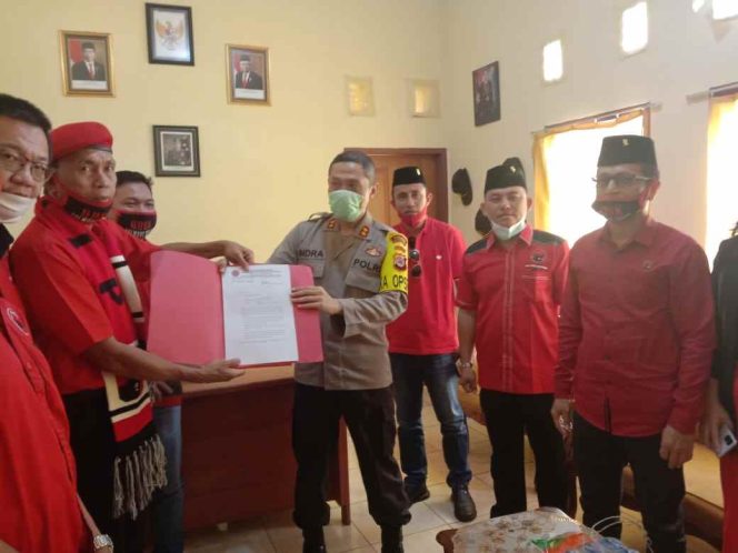 
PDIP Bolmong Laporkan Insiden Pembakaran Bendera Partai di Polres