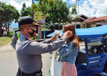 Polres Kotamobagu Gelar Sosialisasi dan Pembagian Masker Gratis Untuk Masyarakat
