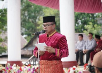 Pjs Bupati Tahlis Gallang Pimpin Upacara HUT ke-175 Bolaang Uki