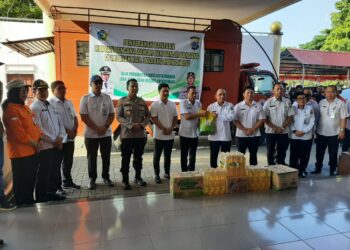 Wenny-Rendi Serahkan Bantuan Pemkot Kotamobagu untuk Korban Banjir di Bolmong