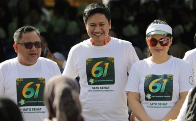 
Wakil Wali Kota Kotamobagu Rendy Mangkat dan istri di peringatan HKN 2025.