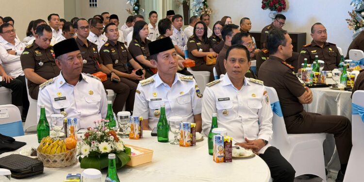 Bupati Bolsel Iskandar Kamaru menghadiri kegiatan Penandatanganan Nota Kesepahaman Perjanjian Kerja Sama serta Hibah Barang Rampasan Negara yang diserahkan kepada Pemerintah Provinsi Sulawesi Utara.