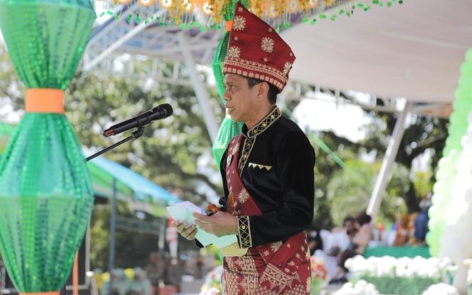 
Wali Kota Weny Gaib menyampaikan sambutan di HUT ke-116 Kotamobagu.